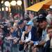 Michigan fans watch the Outback Bowl New Year's eve parade in Ybor City, Fla. on Monday night. Melanie Maxwell I AnnArbor.com